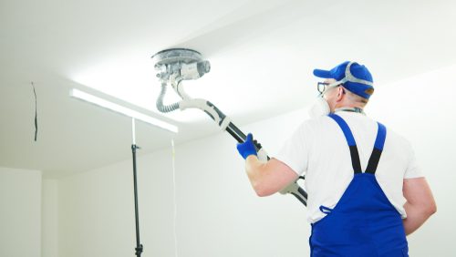Painter,Work,With,Ceiling.,Polishing,And,Sanding,The,Surface,After