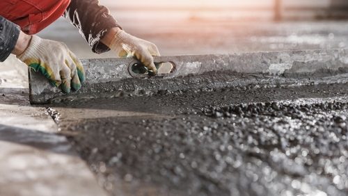 Process,Leveling,Floor,After,Pouring,Cement.,Construction,Site,Worker,Man
