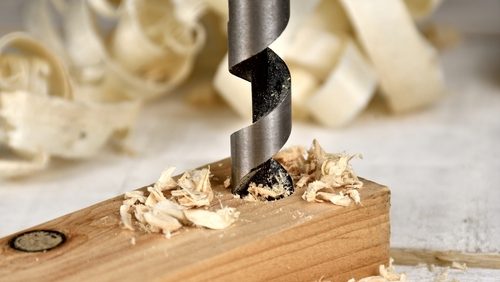 Single,Flute,Auger,Bit,Drilling,Through,Wood,Piece
